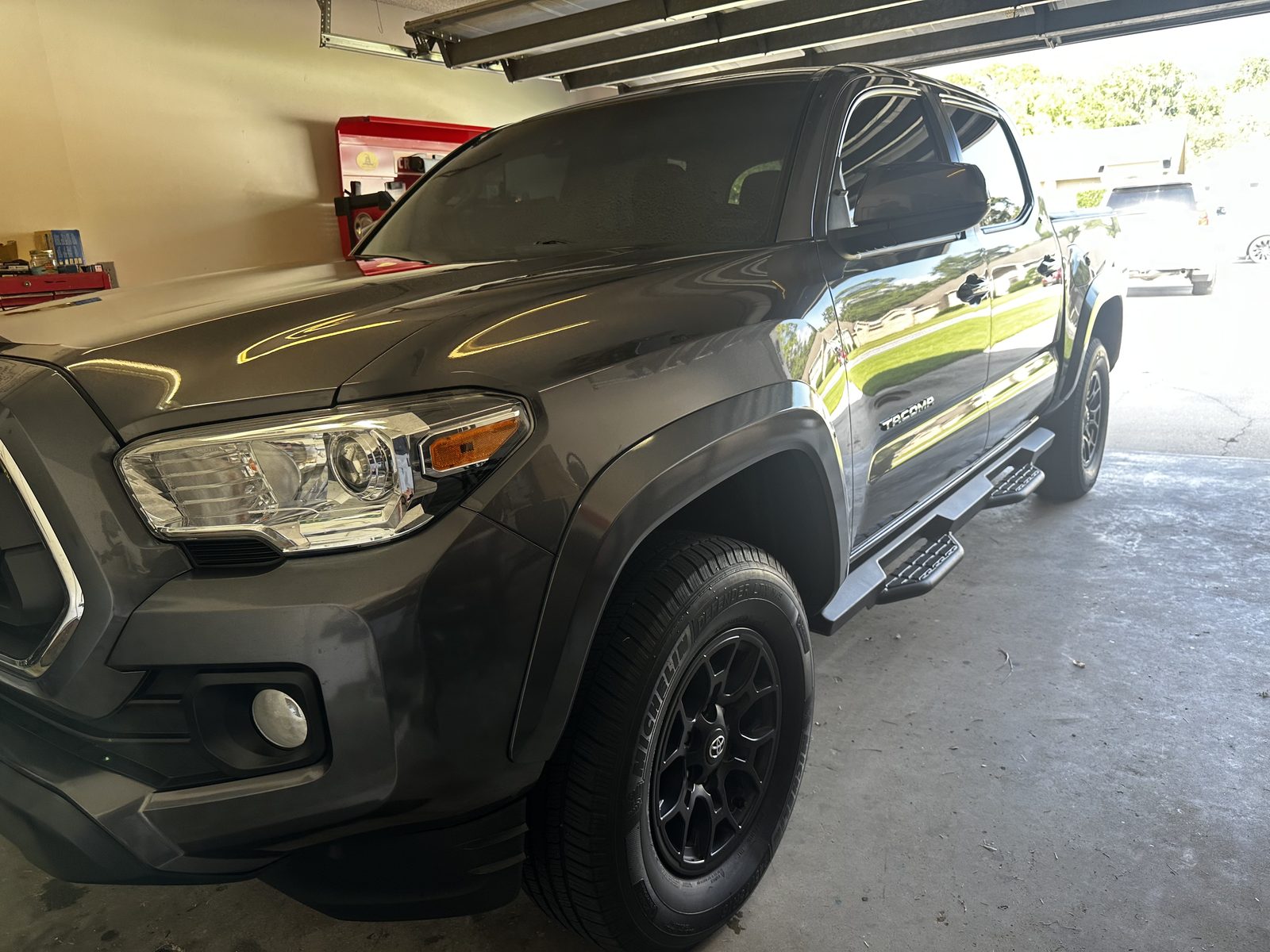 Freshly detailed gray Toyota Tacoma with a glossy exterior finish